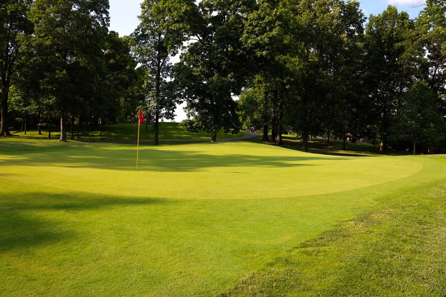 Fairway lined with oaks — classic Kidwell routing