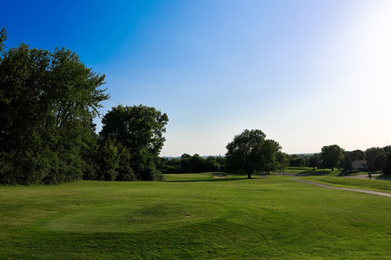 Morning light across a fresh-cut fairway